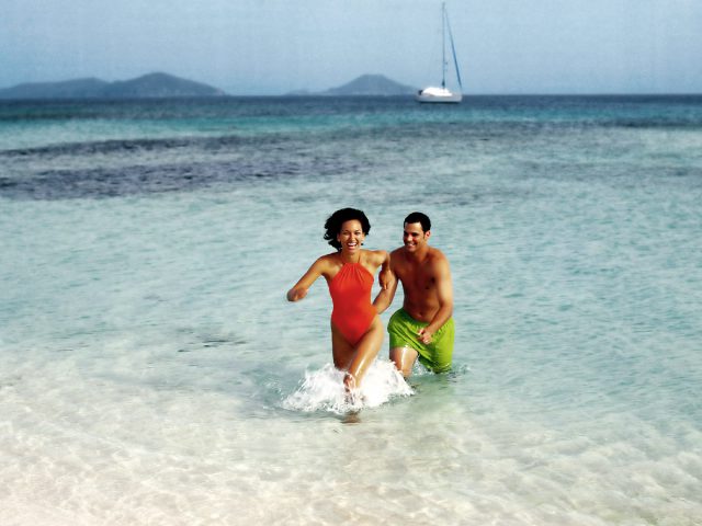 Couple Running In Sea
