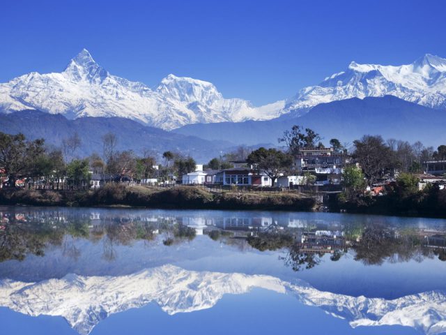 Reflection Of Mountains In A